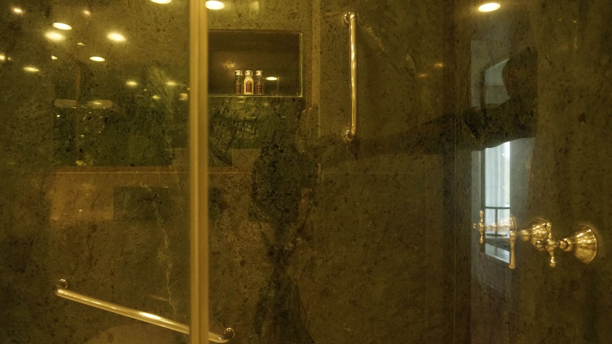 Taj Чандигарх Экстерьер фото A shower with a sliding door